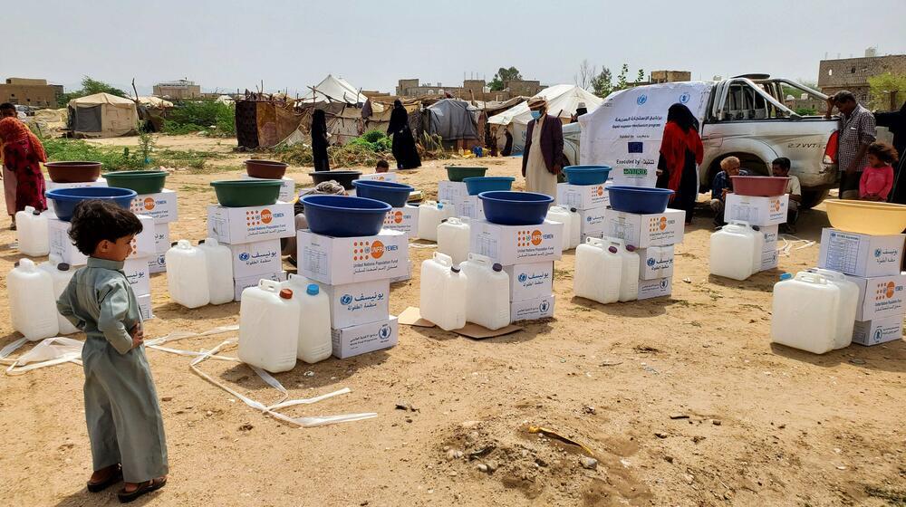 Distributions of kits containing basic health and hygiene items, clothes and ready-to-eat meals are set up for the flooding emer