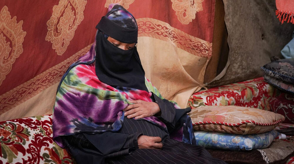 A pregnant woman in an internally displaced persons camp in Aden Governorate, Yemen. Because of funding cuts, UNFPA – the leadin